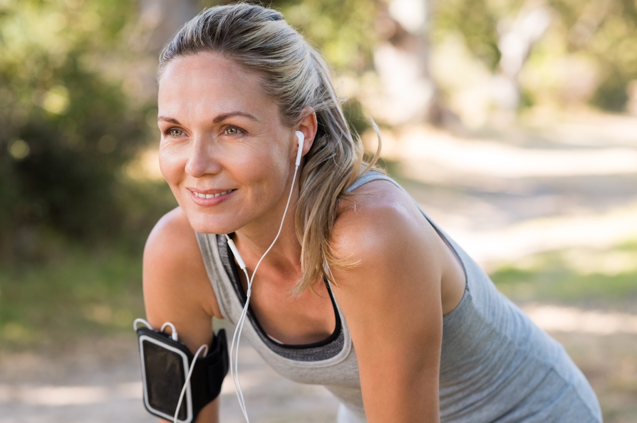 woman smiling on a run