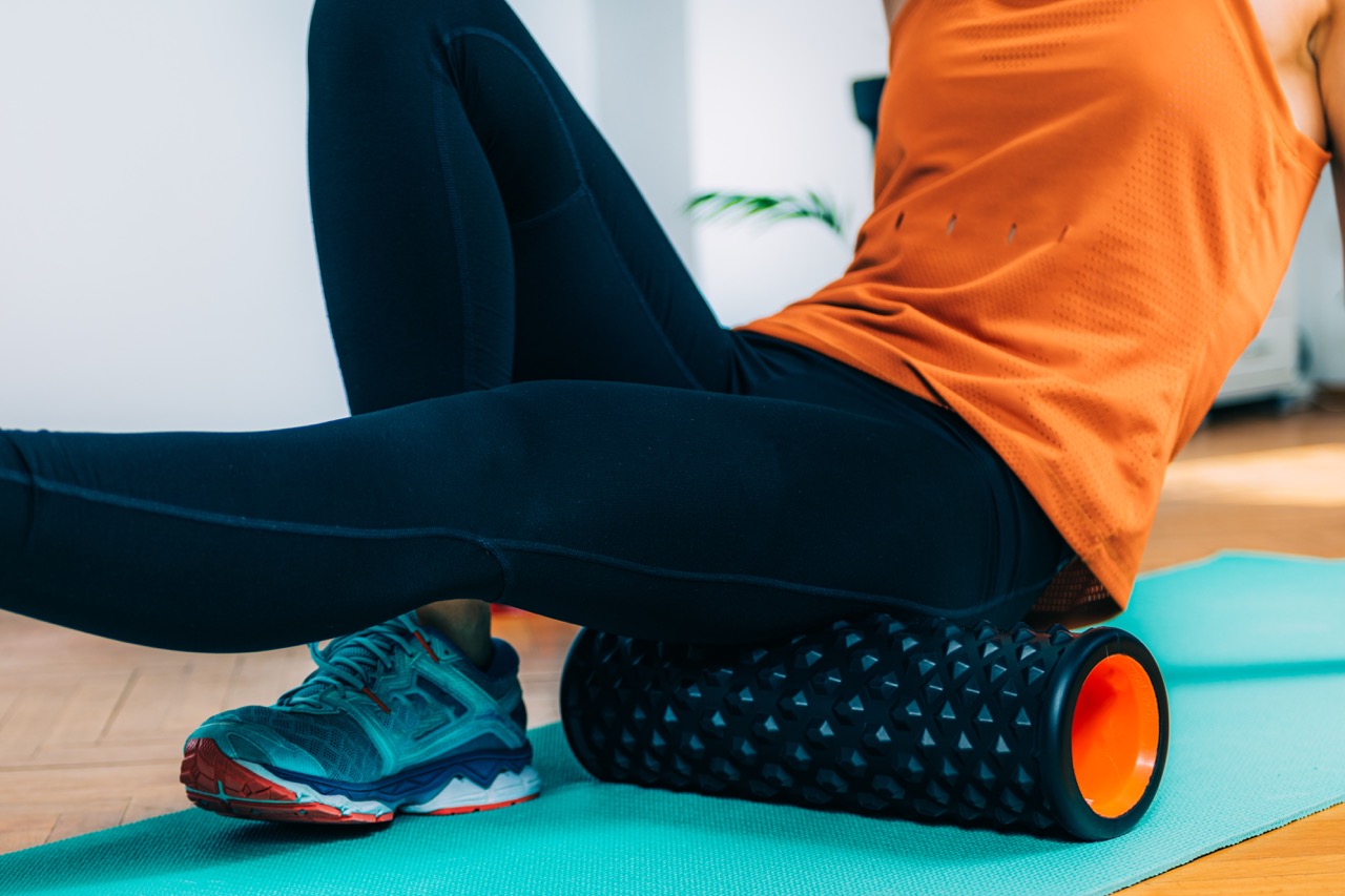 woman on foam roller